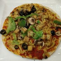 Pizza aux peperronis version vegan at La Piazzetta in Quebec