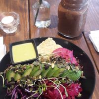 Hummus Avocado bowl with marinated tempeh and a mocha espresso shake at A.VO.KA.DO in Malmo