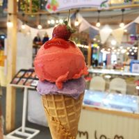 Strawberry and sweet purple potato ice cream along with waffle cone special for vegetarians. at Om La Mai in Chiang Rai