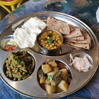 Three different curries with roti at Delhish in Oxford