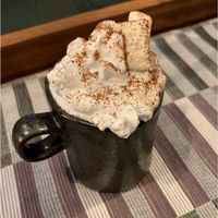 Hot chocolate with whip and mallows at Roots & Shoots Cafe in Bath