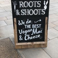 Front signage  at Roots & Shoots Cafe in Bath