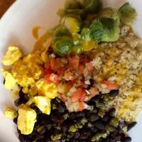 Exhilarating miso ginger scramble with steamed Brussels sprouts, black beans, quinoa & carmelized onions at Sun in Bloom in Brooklyn