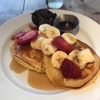 These vegan/gluten free pancakes are to die for. I also added a side of Shiitake bacon & that just packed on the greatness. This is an everyday breakfast meal for me when it comes to Sun In Bloom. First restaurant I've had vegan pancakes at & now I don't want to try anywhere else. Haha. at Sun in Bloom in Brooklyn