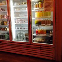 Juices and prepared food ready to purchase and consume at Sun in Bloom in Brooklyn