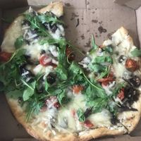 Mushroom, vegan cheese, arugula pizza. SO Delicious?  at Moondog in Key West