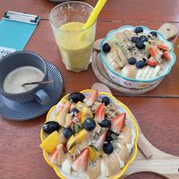 Passion fruit smoothie, oatmeal based fruit/berry bowls and added peanut butter. Coffee with oatmilk  at Every Fresh Bar in Penang