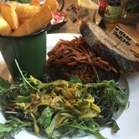 Peanut & quinoa burger with pickled cabbage, Thai ginger and sesame salad  at The Dolphin in Leiston