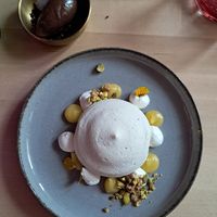 Spring menu 2025 - saffron pavlova at Magu in Helsinki