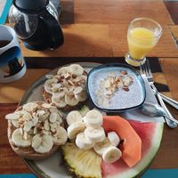 Big Breakfast w/ Chia Pudding and Peanut Butter Whole wheat Bagel at Namaste in Caye Caulker