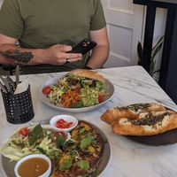 $60 worth of food. Crepe, mushroom doughnut and avo scramble. at Mettā Sol in Goodwood