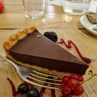 Vegan chocolate pie with raspberry layer at Aromaticus in Rome