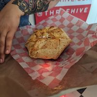 Pizza crunchwrap at The BE-Hive in Nashville