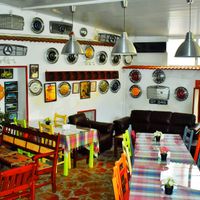 Our delightful dining area is adorned with quirky images of the past, antiques and memorabilia... at Gazan in Kyrenia