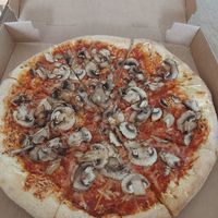 Mushroom pizza at Domino's Pizza - Waterlandplein in Amsterdam