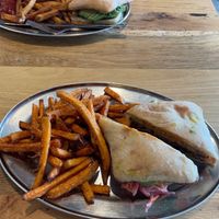 Kimchi reuben (made vegan) with sweet potato fries at Green Sage Cafe - Broadway in Asheville