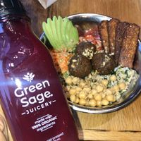 Beet juice and falafel bowl with added tempeh!  at Green Sage Cafe - Broadway in Asheville