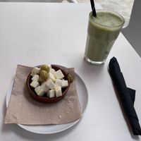 Marinated cheese and matcha latte at Cafe Madrigal in Valencia