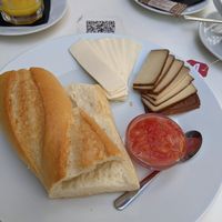 Breakfast: tostada w/ cheese, tofu & tomato spread. at Cafe Madrigal in Valencia