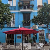 Outdoor sitting area at Cafe Madrigal in Valencia