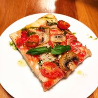 Vegan pizza with basil olive oil 😋 at Cafe Madrigal in Valencia