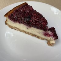 cheesecake with red berries  at Cafe Madrigal in Valencia