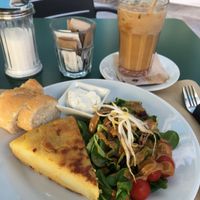 Tortilla and salad. With an iced coffee.   at Cafe Madrigal in Valencia