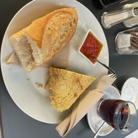 tortilla de patata in a breakfast menu. tostada y tomate  at Cafe Madrigal in Valencia