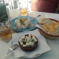 Queso marinado and ensaladilha alemana at Cafe Madrigal in Valencia