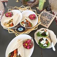 Vegetarian Wraps in vegan bread with vegan falafel additional vegan hummus and tahini  at Pasha in Tulum