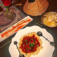 Vegan hummus topped with extra sweet peppers  at Pasha in Tulum