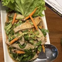 Vegetarian pork neck salad with chili, lime juice and herbs  at L'Orangerie in Bangkok