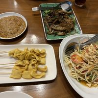 Satay, Somtum and vegetarian duck stir fried with herbs  at L'Orangerie in Bangkok