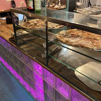 the pizza at the counter   at Screamer's Pizzeria - Crown Heights in Brooklyn