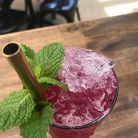 About to enjoy this toothless mojito mocktail. Ginger ale, dragon fruit, mint, & lime. Very refreshing.  at BKA Vegan in Burleigh Heads