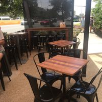 Small patio area. It is right along the highway, but I hardly even noticed it.  at BKA Vegan in Burleigh Heads