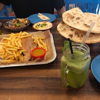 2 falafel/mixed veg sandwiches with really good fries. We all loved the roasted veg plate with cauliflower and eggplant and the fresh bread and hummus were fantastic. at Tarma in Kuala Lumpur