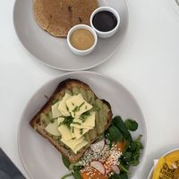 Avocado paste toast and pancake with salted caramel and chocolate sauce.  at Maria Limão in Lisbon