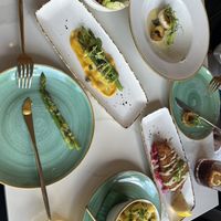 Caeser salad, oyster mushroom scallops, asparagus, macaroni cheese, schnitzel  at Twelve Eatery in Bournemouth