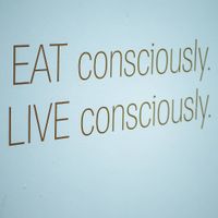 The restaurant's motto on their wall at The Milkman's Daughter in Mermaid Beach