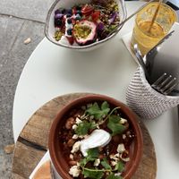 Vegan granola and Shakshouka   at The Milkman's Daughter in Mermaid Beach