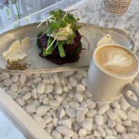 Beetroot zucchini fritters and soy lattees  at The Milkman's Daughter in Mermaid Beach