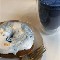 Vanilla doughnut and blue latte (blue spirulina powder and frothed milk, sounds a bit odd but so delicious) at Naked Bakery in Edinburgh