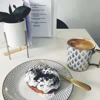 oreo donut and oat latte at Naked Bakery in Edinburgh