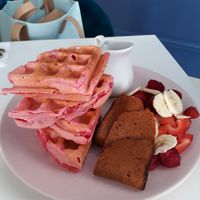 Pink waffles with berries, cream and Sgaia bacon at Naked Bakery in Edinburgh