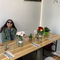 Flowers adorn the table  at Mon Resto Sans Gluten in Paris