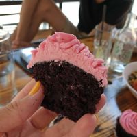 Moist mouthwatering chocolate cupcake with raspberry frosting at Sweets by Pepper in Geneva