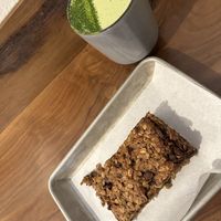 Matcha latte with oat milk and v/gf monkey bar  at Good Seed Cafe in Solvang