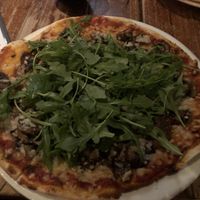 ‘Mount Victoria 1064m’ - Macadamia pesto base, pine nuts, sautéed field mushrooms topped with rocket and vegan cheese   at Station Bar & Woodfired Pizza in Katoomba