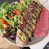 Avocado hummus toast at The Visit Coffee Roastery in Berlin